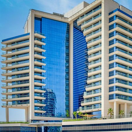 Hotel The First Collection Dubai Business Bay Extérieur photo The building of the National Bank of Rwanda