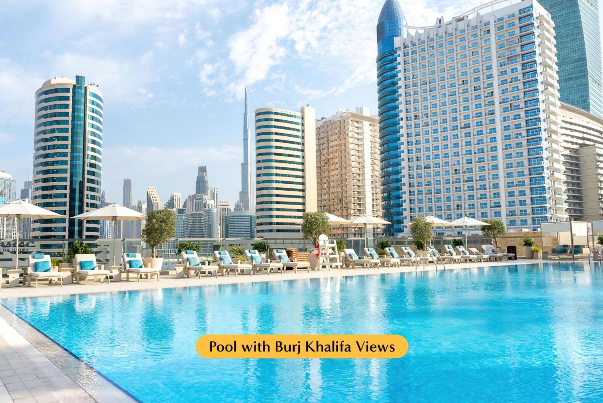 Hotel The First Collection Dubai Business Bay Extérieur photo Pool with Burj Khalifa views
